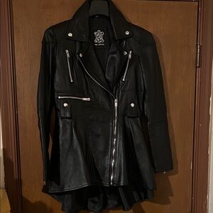 Peplum Real Leather Black Leather Women's Jacket with Silver Accents.